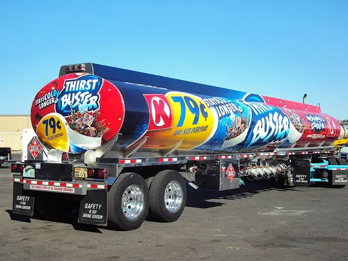 A tanker truck with colorful graphics